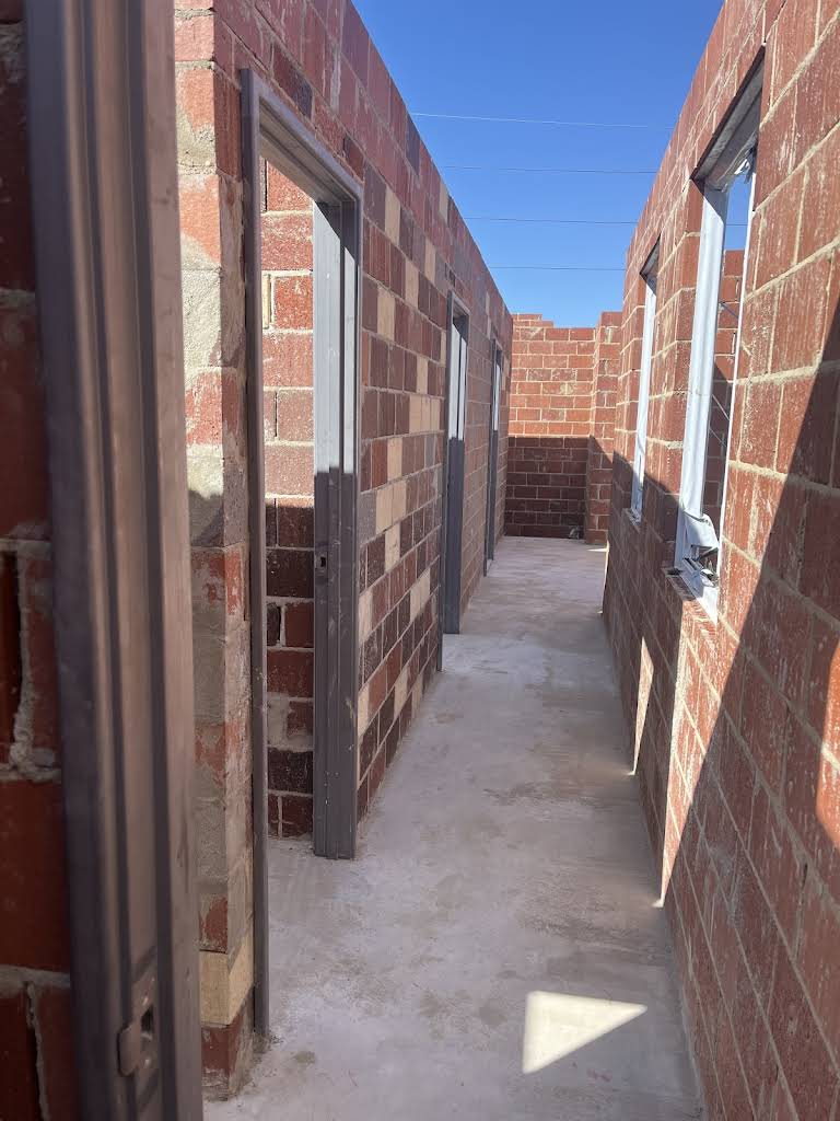 Maçon ABSL Bricklaying au travail